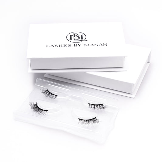 Set of false eyelashes HS22 in a 'Lashes by Manan' box on a white background