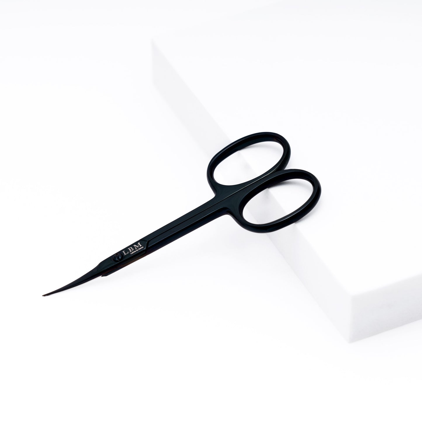 Black scissors on a white background