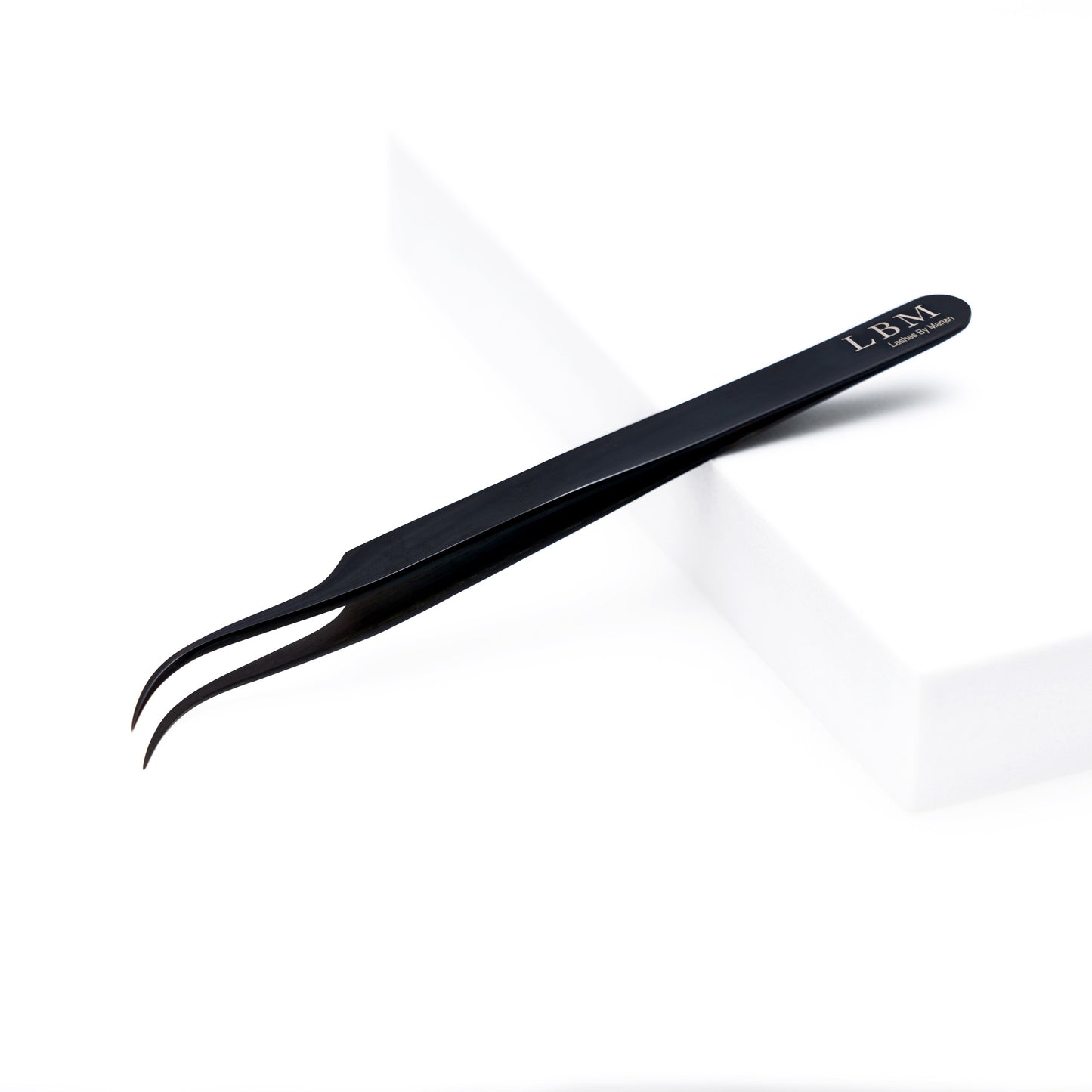 Black tweezers with 'LBM' branding on a white background