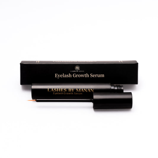 Eyelash growth serum with black packaging on a white background