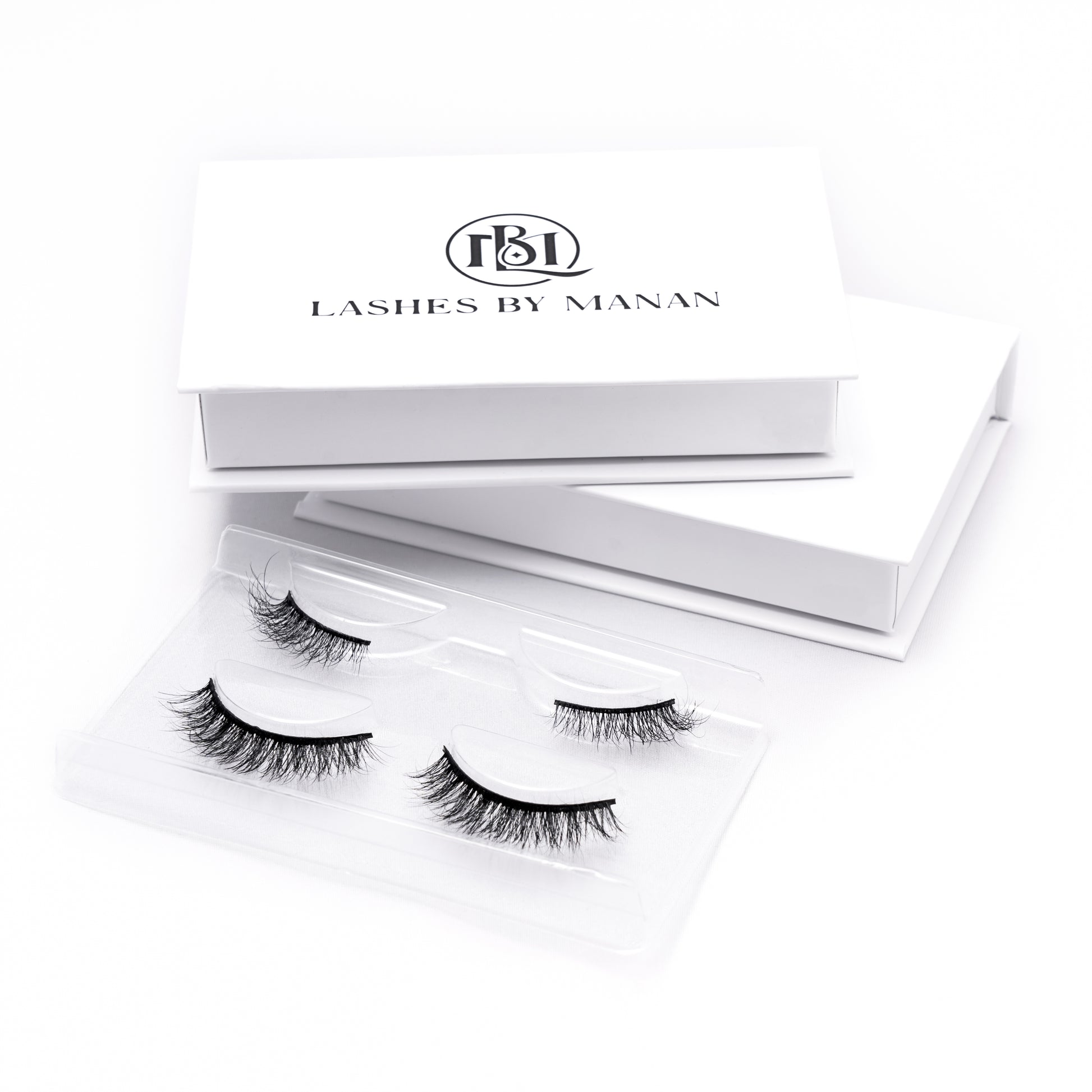 Set of false eyelashes HB17 in a 'Lashes by Manan' box on a white background
