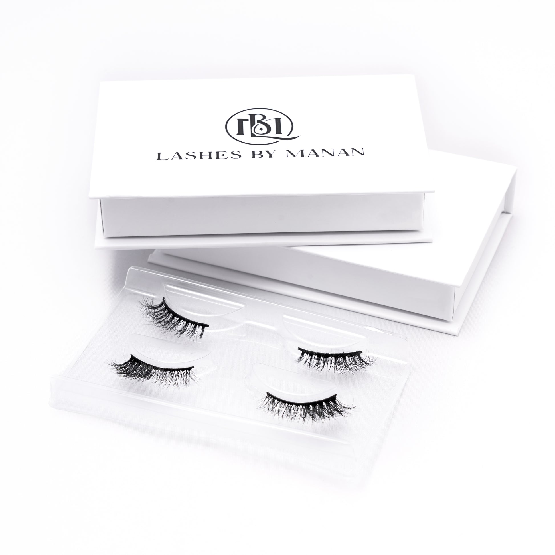 Set of false eyelashes HS04 in a 'Lashes by Manan' box on a white background
