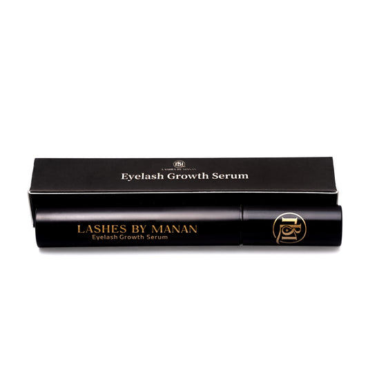 Eyelash growth serum packaging with 'Lashes by Manan' branding on a white background