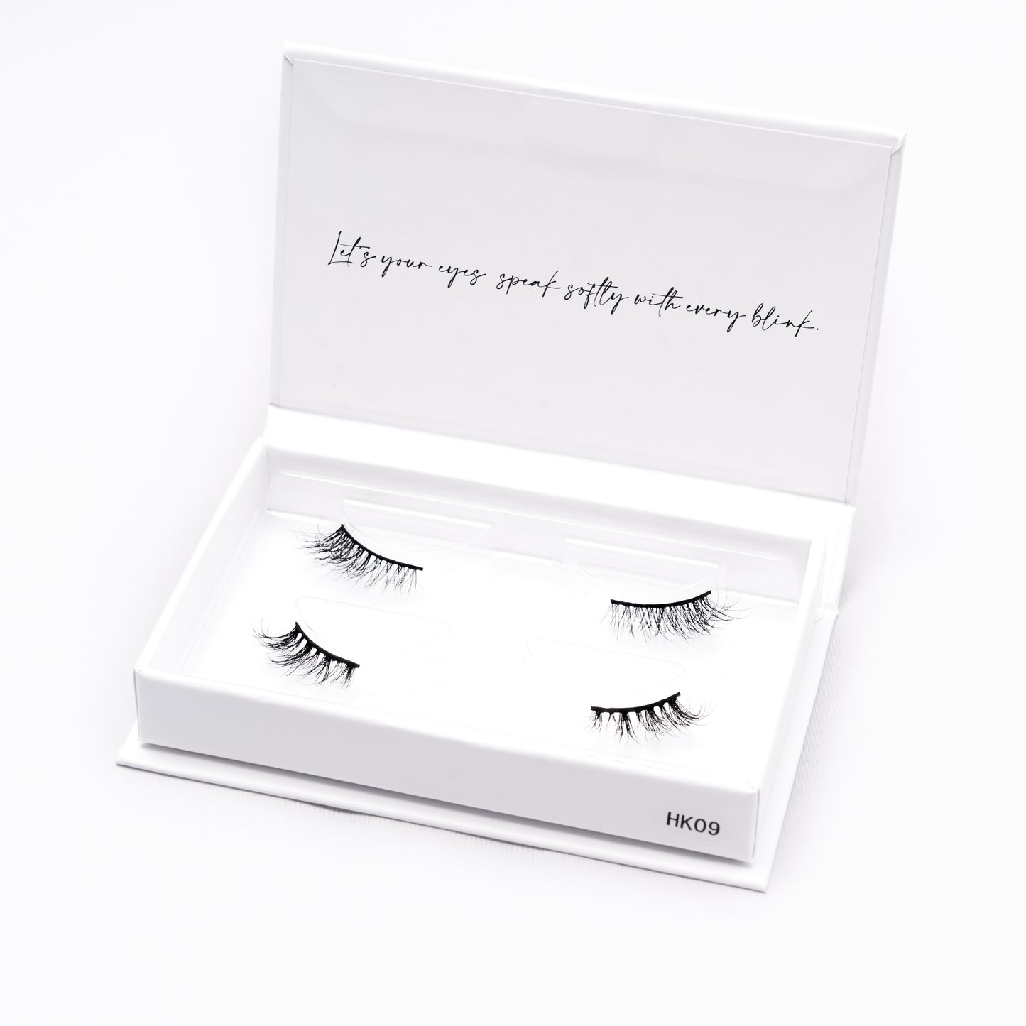 Set of 2 pairs of 3D Mink Lashes style HK09 in a white box with text on a white background