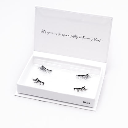 Set of 2 pairs of 3D Mink Lashes style HK09 in a white box with text on a white background
