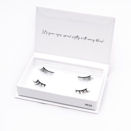 Set of 2 pairs of 3D Mink Lashes style HK09 in a white box with text on a white background