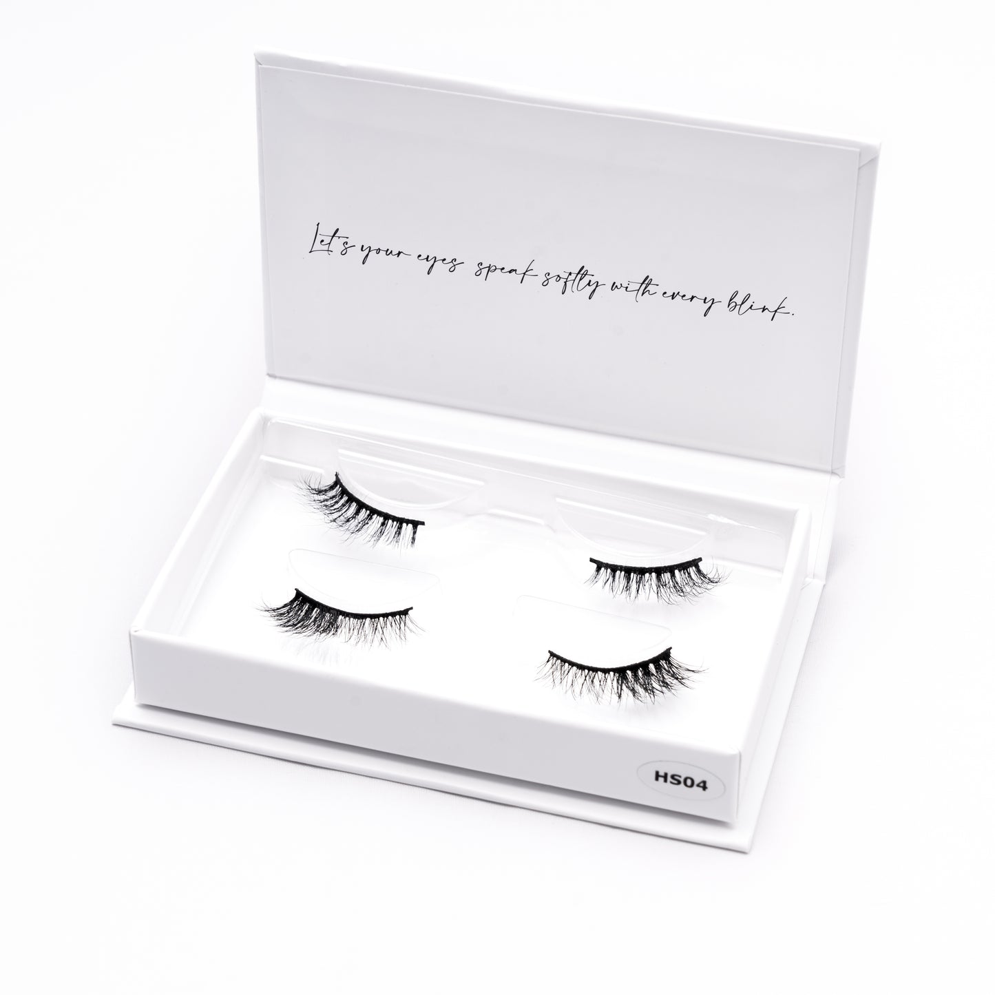 Set of 2 pairs of 3D Mink Lashes style HS04 in a white box with text on a white background